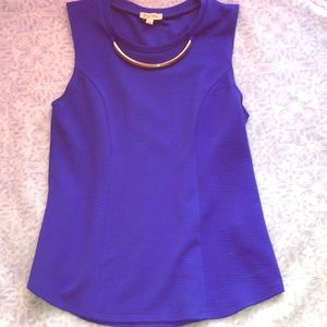 A blue formal top